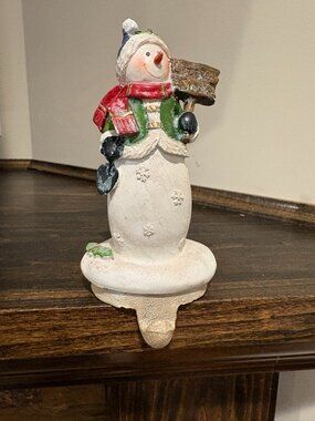 Vintage cast iron stocking holder, Snowman with a "let it snow sign" and shovel